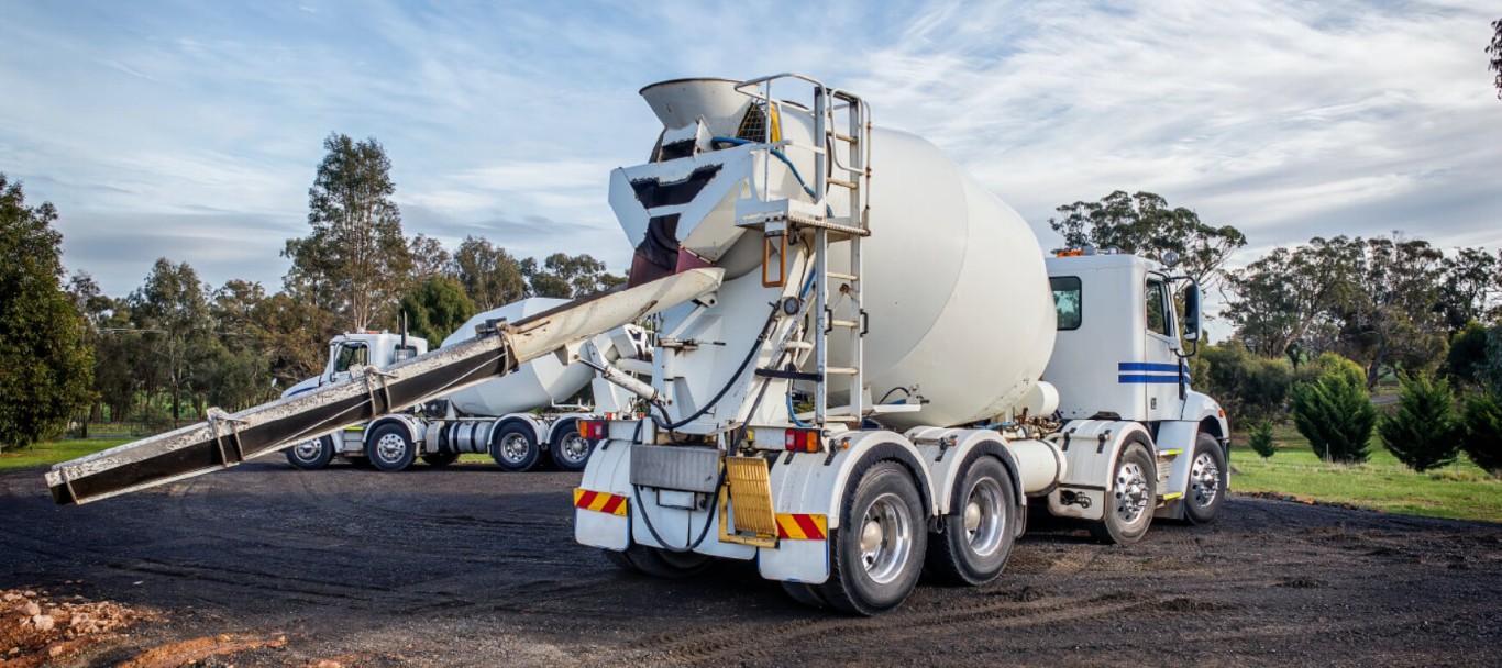 Concrete mixer truck delivering fresh concrete for residential project in Carson, CA